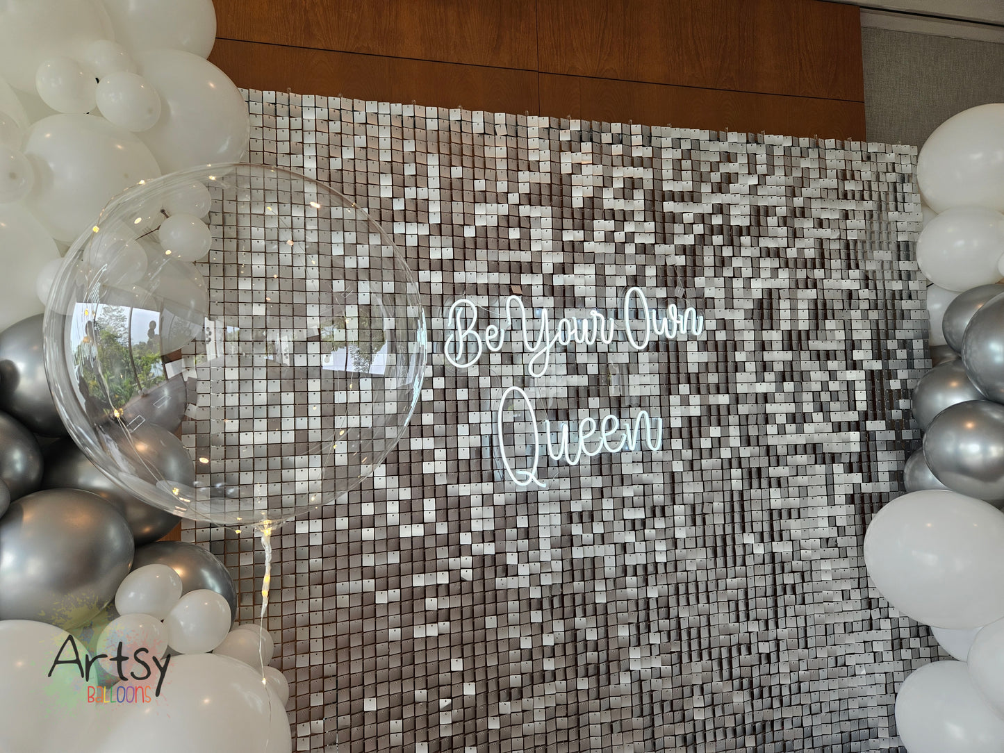 Silver Shimmer Backdrop with Organic Balloon Garland, Paper Plinth, LED Signage