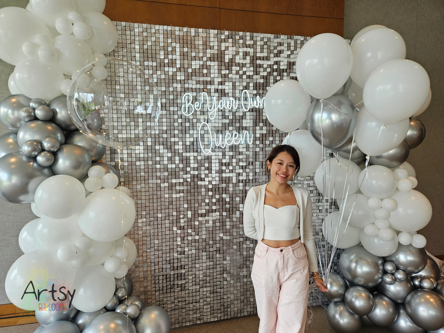 Silver Shimmer Backdrop with Organic Balloon Garland, Paper Plinth, LED Signage