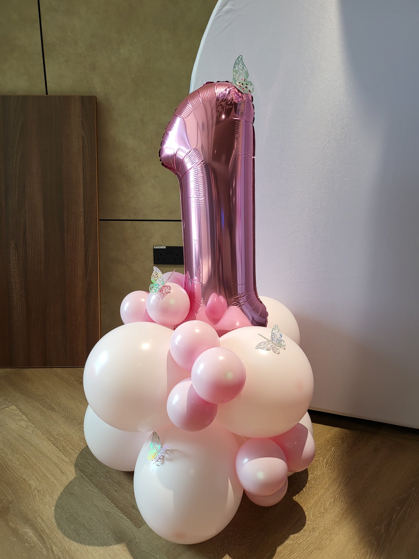 Pastel Organic Rainbow Balloon Garland with Cascading White Fabric Backdrop