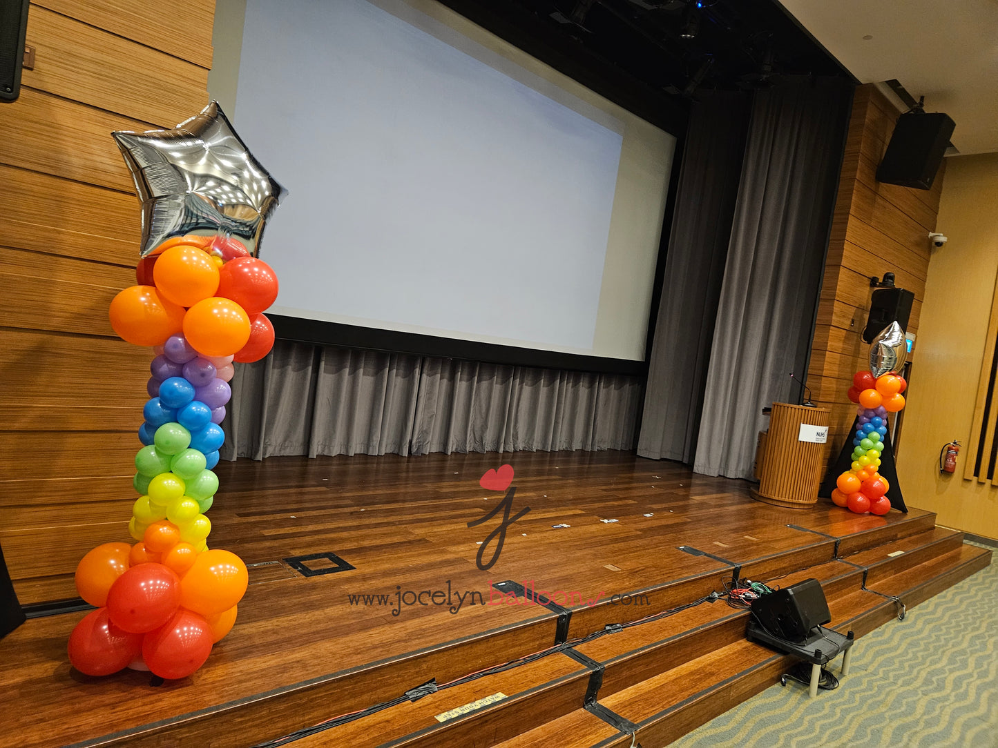 A Pair of Rainbow Star Balloon Columns