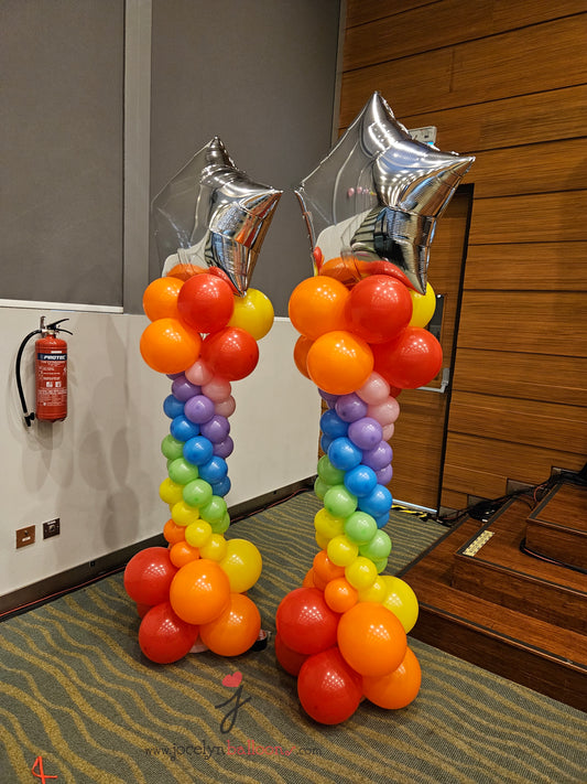 A Pair of Rainbow Star Balloon Columns